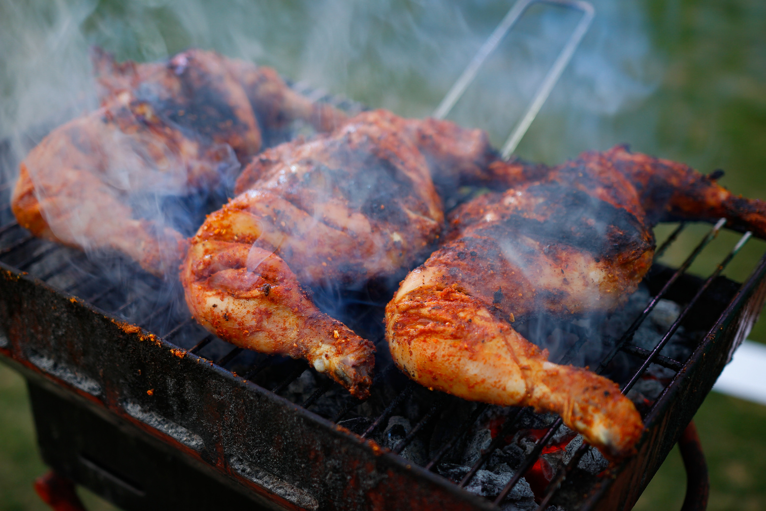 Grilled Chicken on Black Charcoal Grill